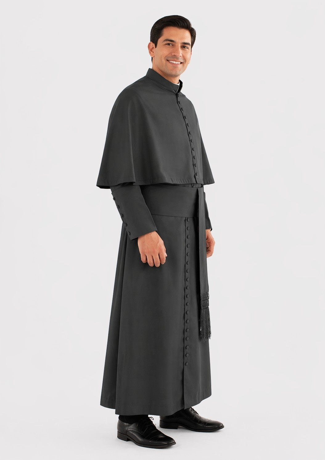 Man wearing a gray cassock on a white background