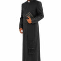 Priest wearing a black robe holding a book on a white background