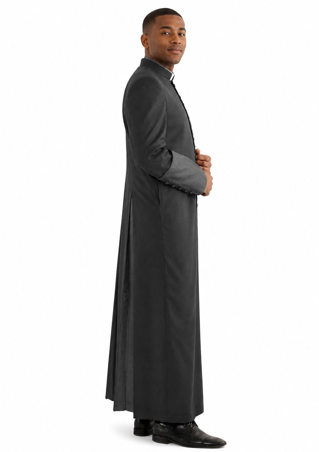 Man wearing a long dark gray coat on a white background