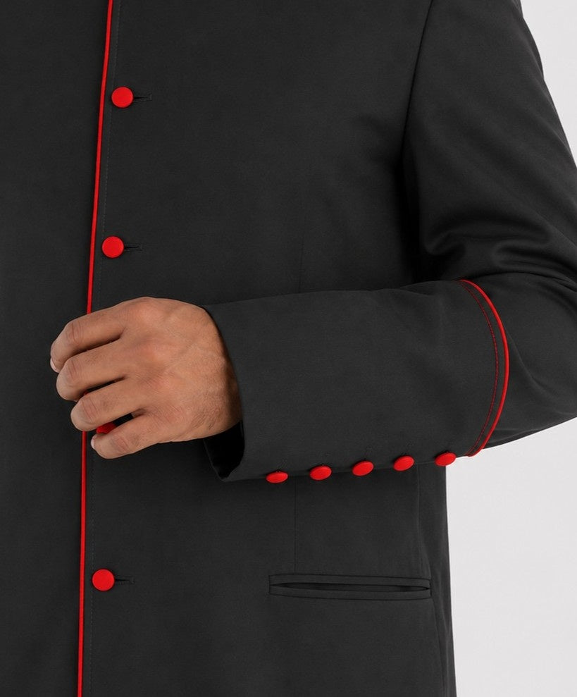 Black coat with red buttons on a white background