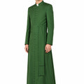 Man wearing a long green robe with buttons on a white background