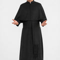 Man wearing a black religious robe on a white background