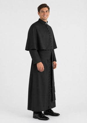 Man wearing a black religious robe on a white background