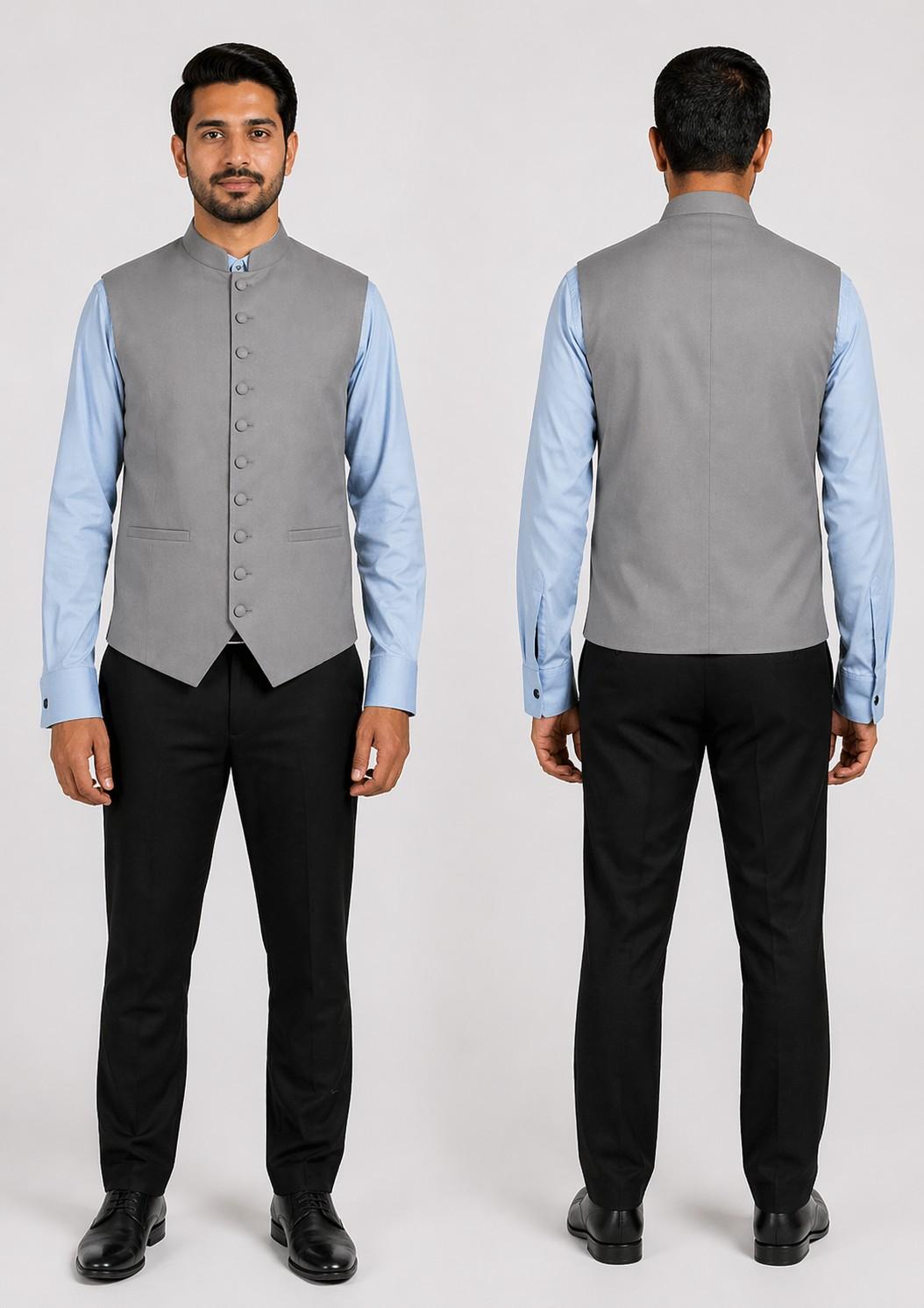 Man wearing a gray vest over a light blue shirt with black pants, shown from front and back.