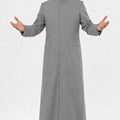 Man wearing a gray priest's robe on a white background