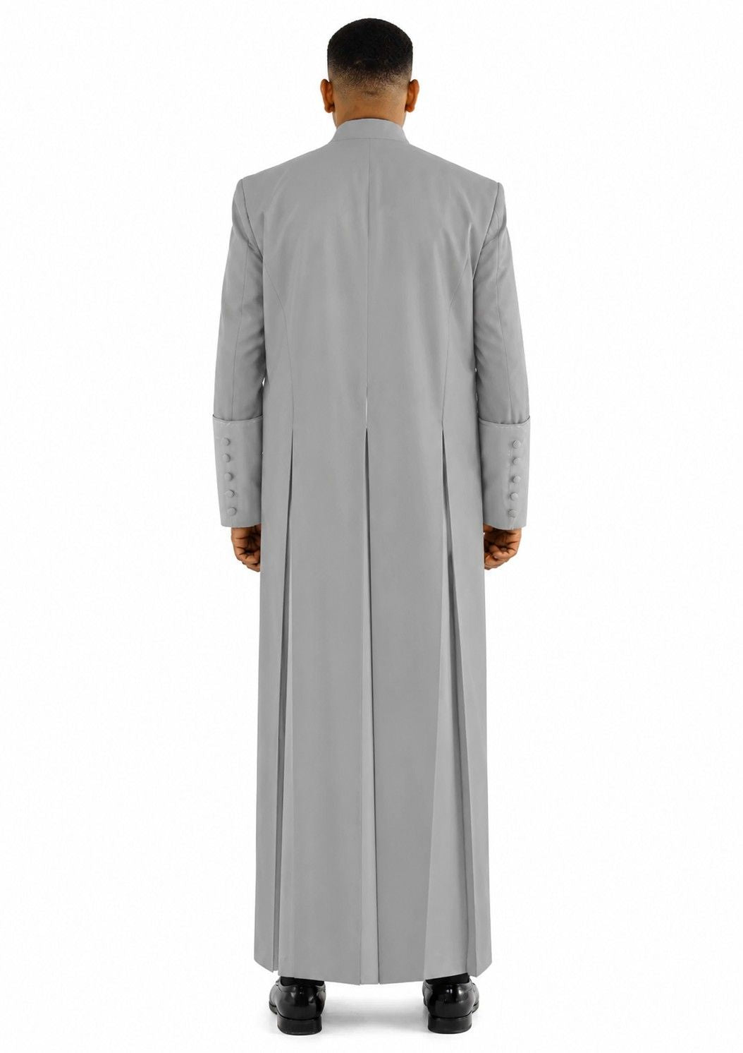 Man wearing a long gray coat on a white background