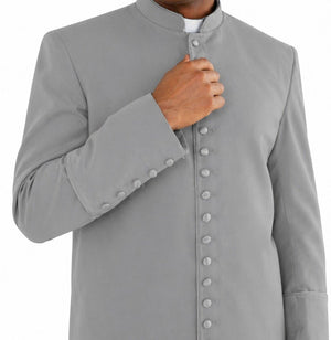 Man wearing a long gray coat on a white background