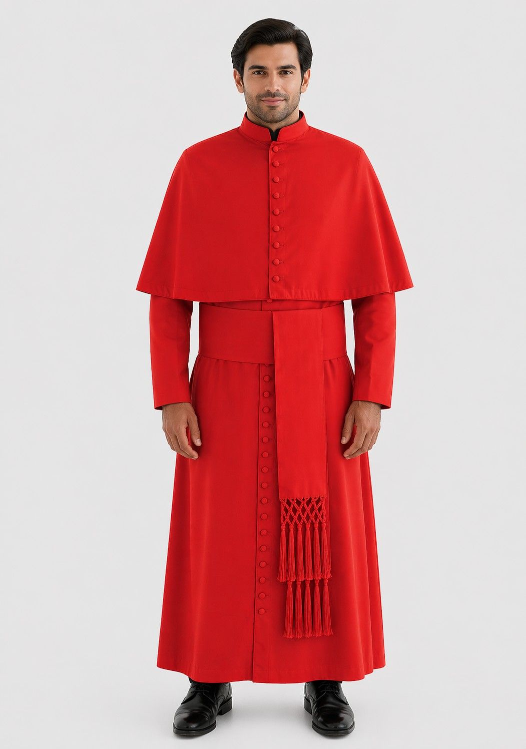 Man wearing a red religious robe with a stole on a white background