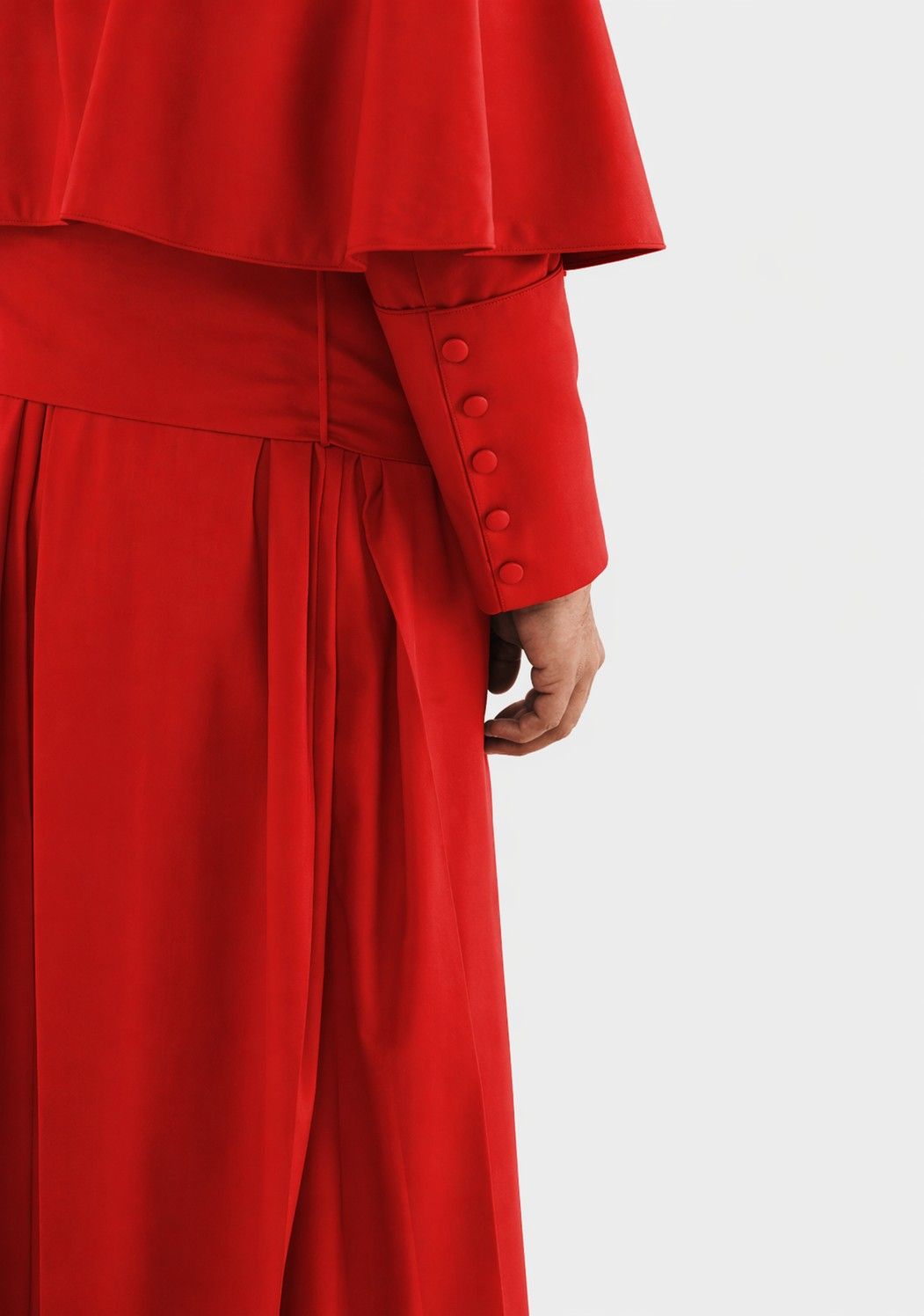 Red rope with buttons on a white background