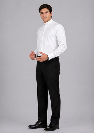 Man wearing a white dress shirt and black pants on a gray background