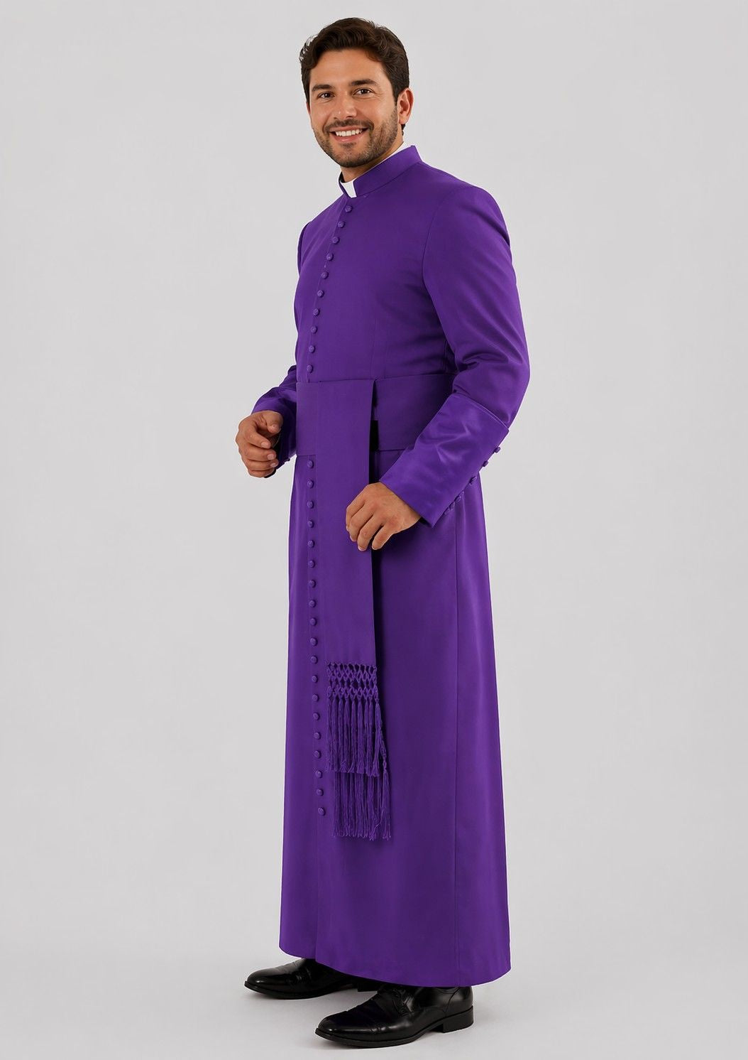 Man wearing a purple robe with a white background