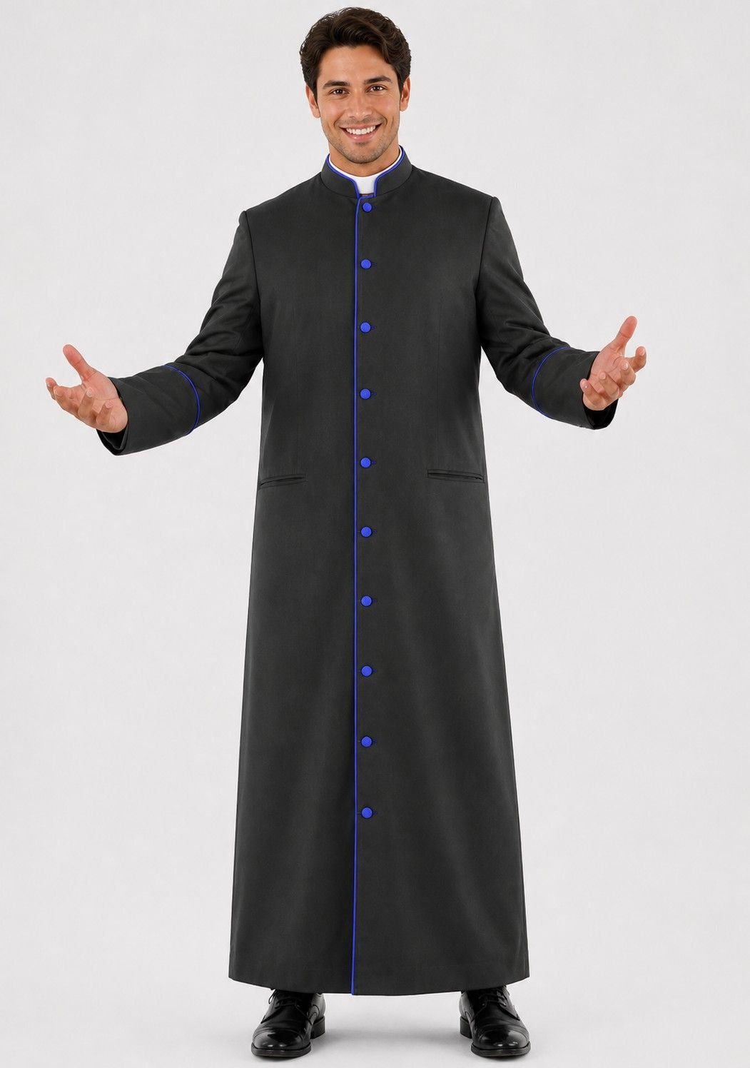 Man wearing a black robe with blue buttons on a white background