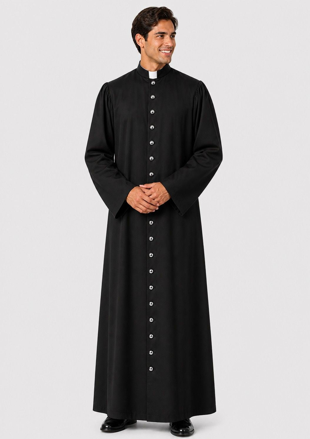 Man wearing a black priest's robe on a white background