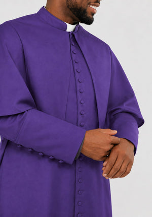 Man wearing a purple robe with a white collar on a white background