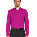 Man wearing a bright magenta shirt and black pants on a white background