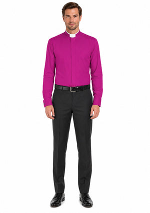 Man wearing a bright magenta shirt and black pants on a white background