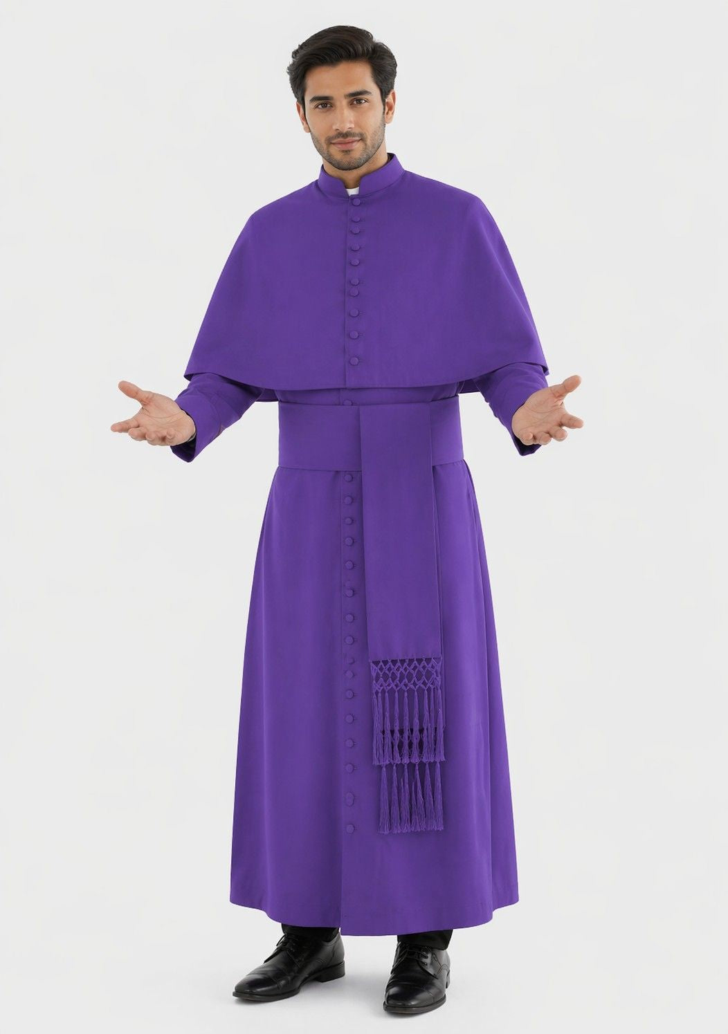 Man wearing a purple religious robe on a white background