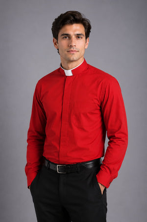 Man wearing a red dress shirt and black pants against a gray background