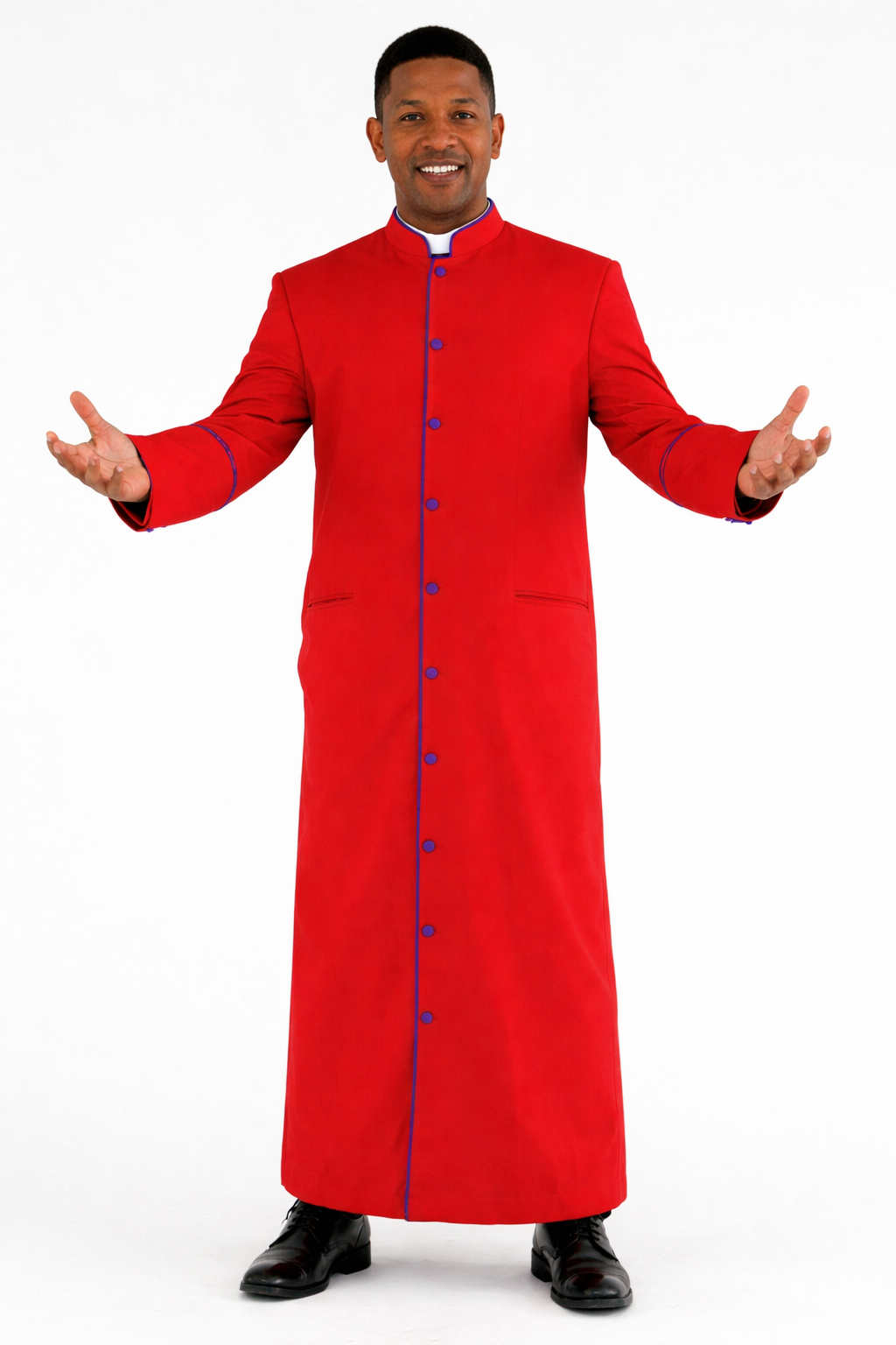 Man wearing a red robe with purple accents on a white background