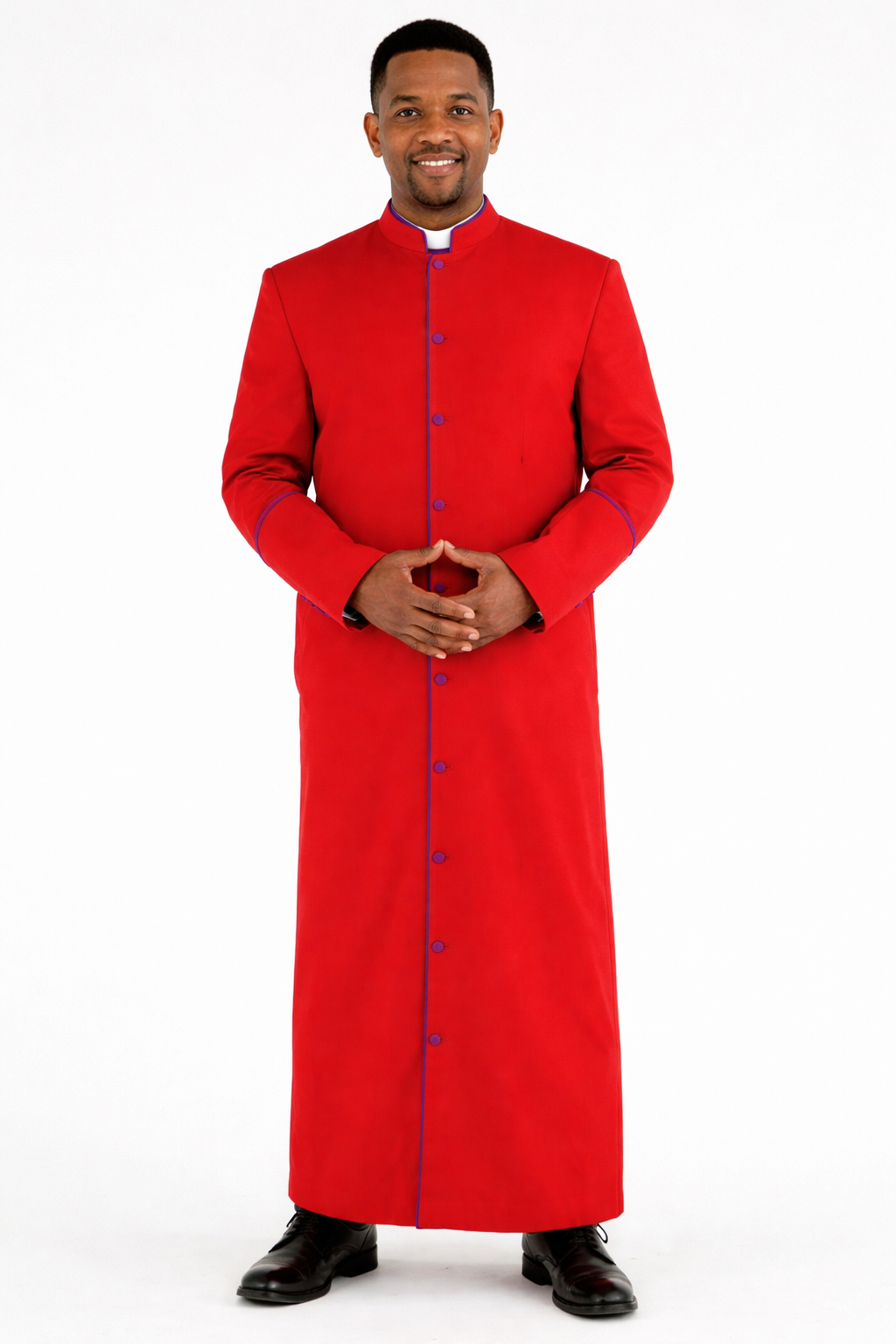 Man wearing a red robe with purple buttons on a white background