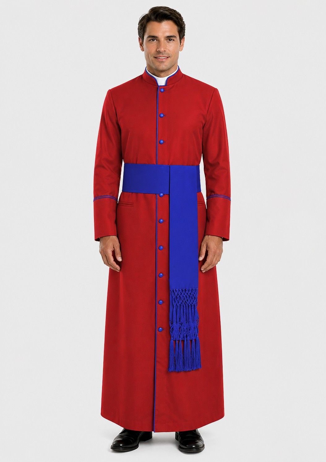 Man wearing a red and blue robe with a white background
