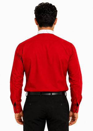 Man wearing a red shirt and black pants on a white background