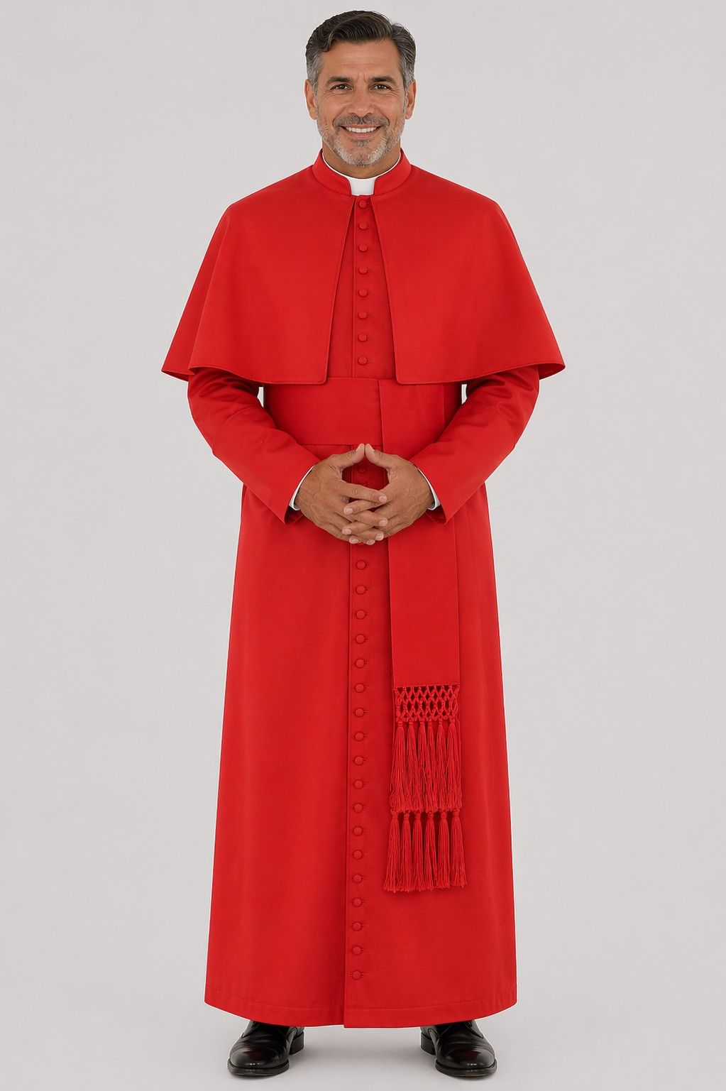 Person wearing a red religious robe on a gray background