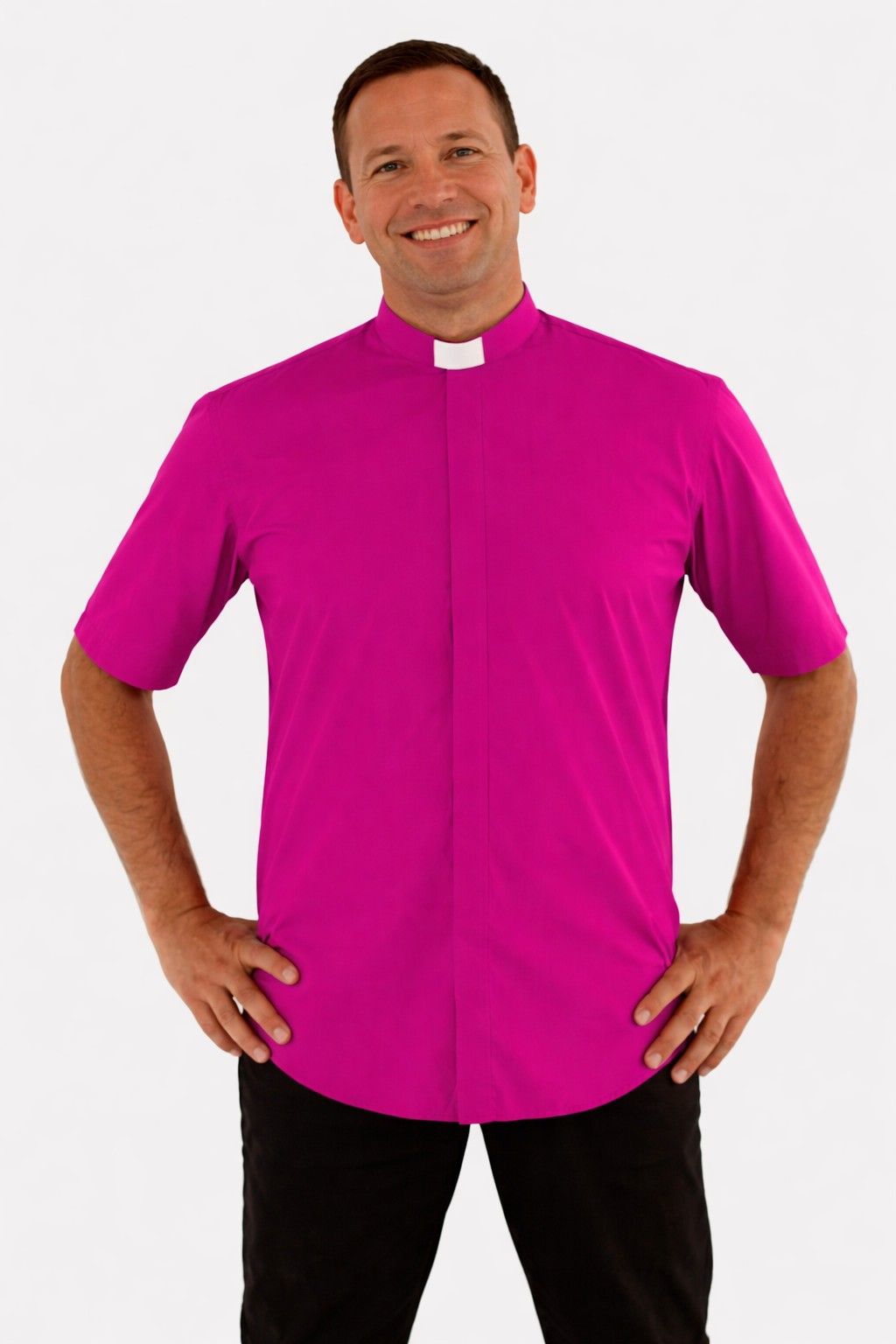 Man wearing a bright pink clerical shirt with a white collar on a white background