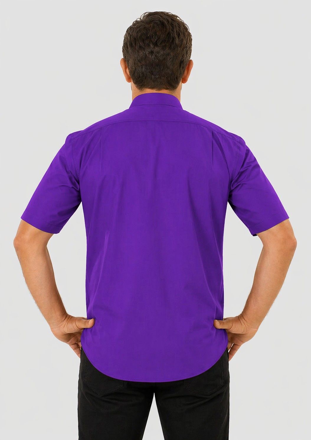 Man wearing a purple shirt against a white background