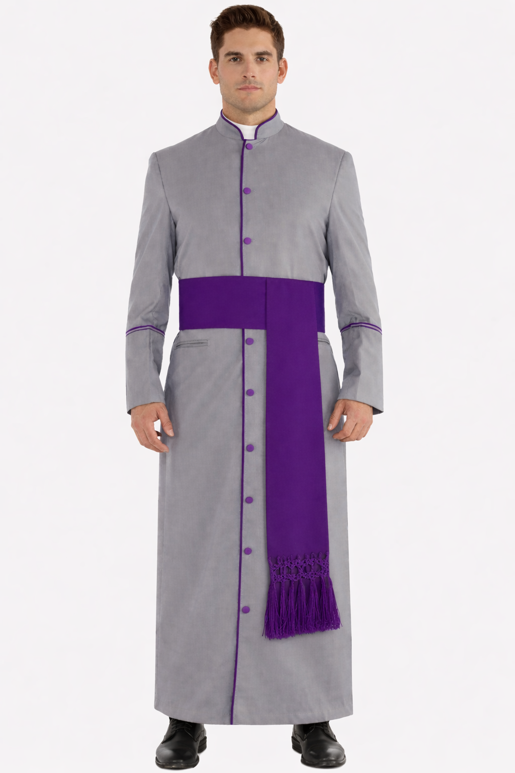 Man wearing a gray robe with purple accents on a white background