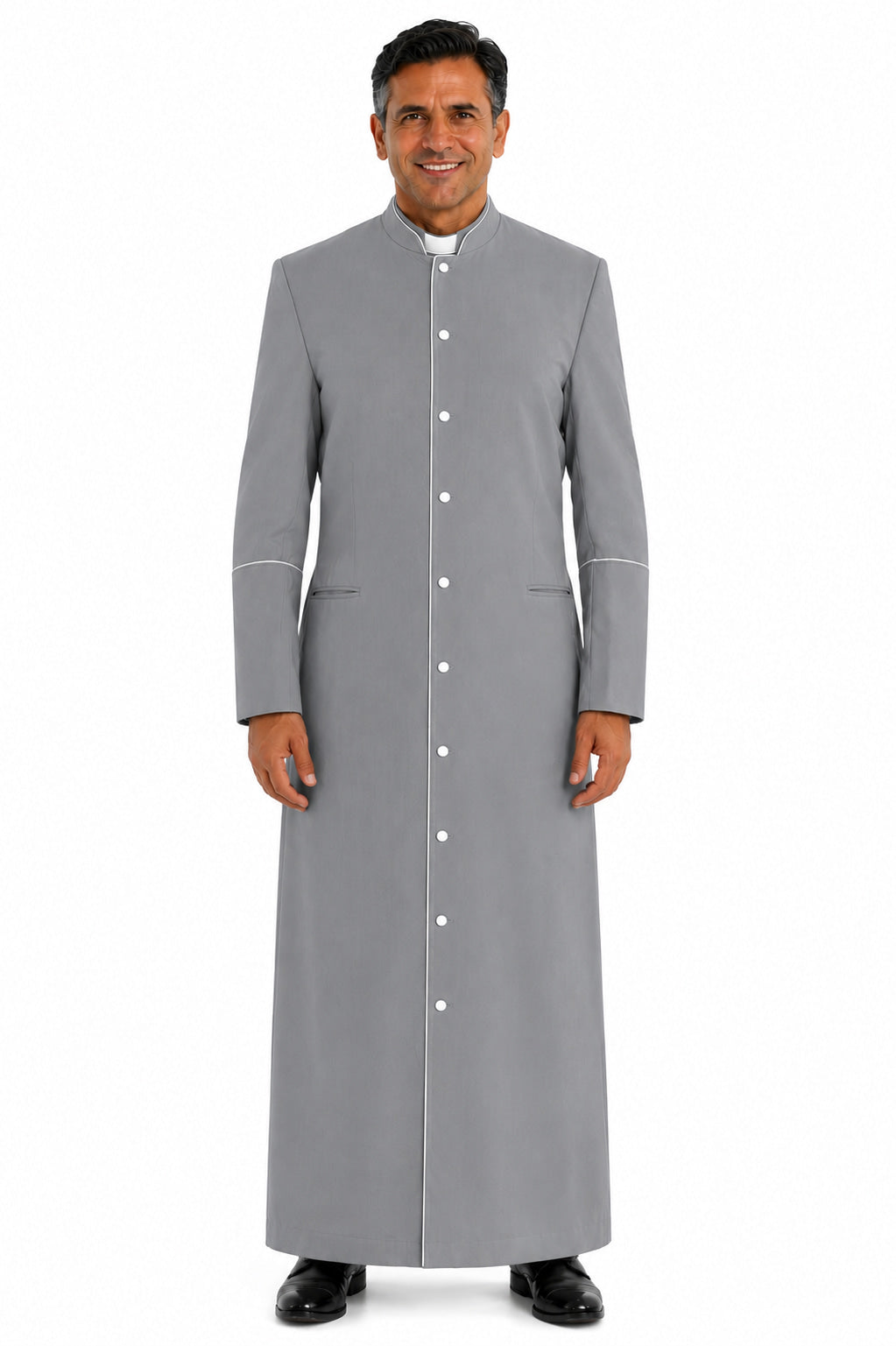 Man wearing a long gray robe with white buttons on a white background