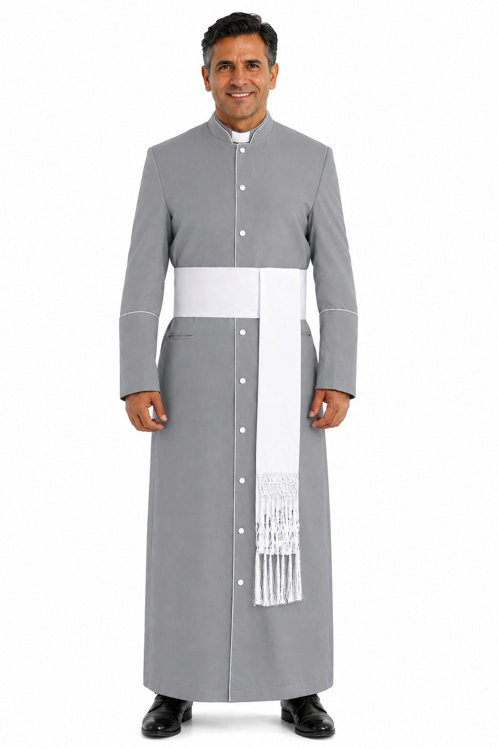 Man wearing a gray clerical robe with a white stole on a white background