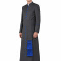Man wearing a dark gray robe with blue accents on a white background
