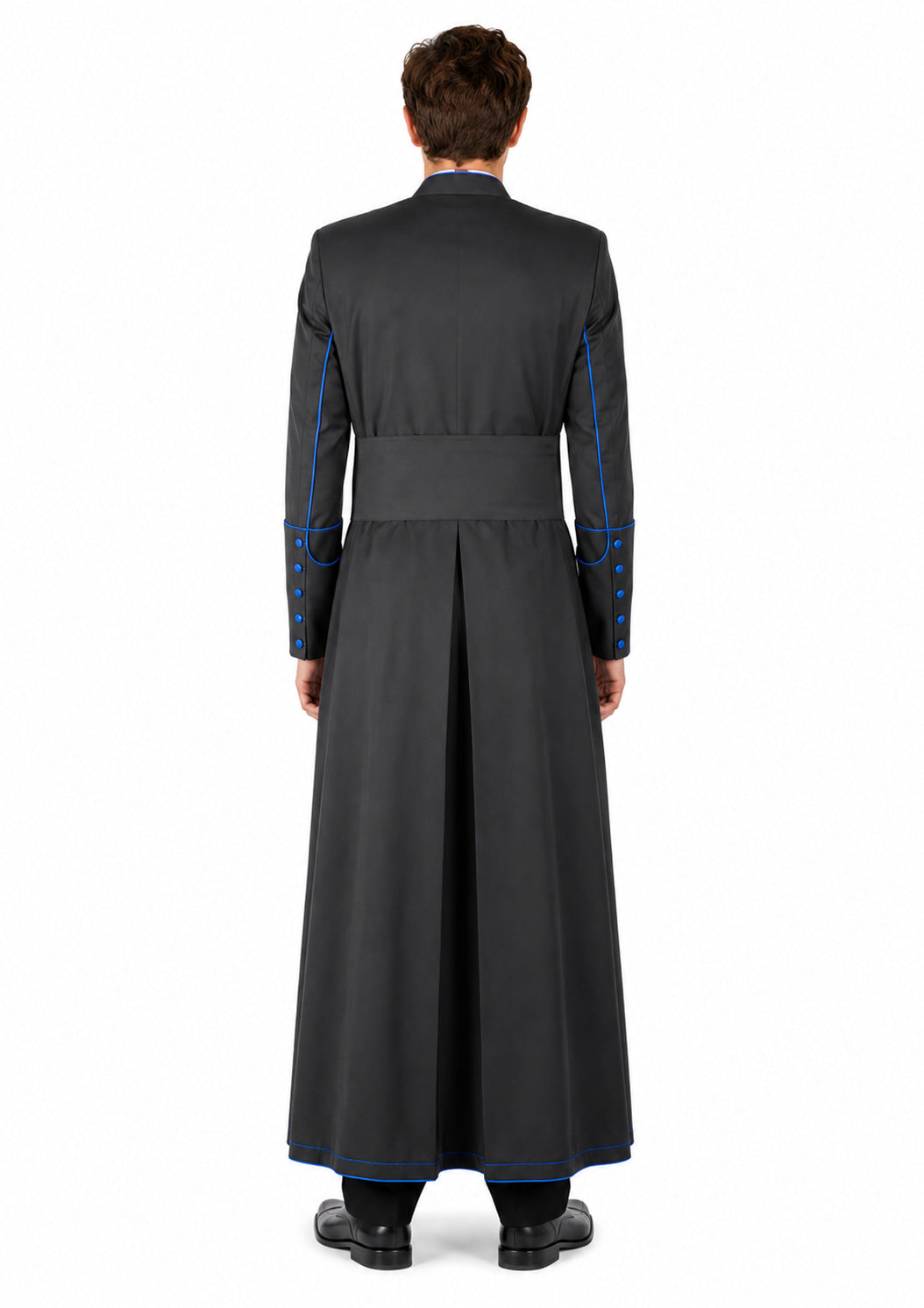 Man wearing a long black robe with blue accents on a white background