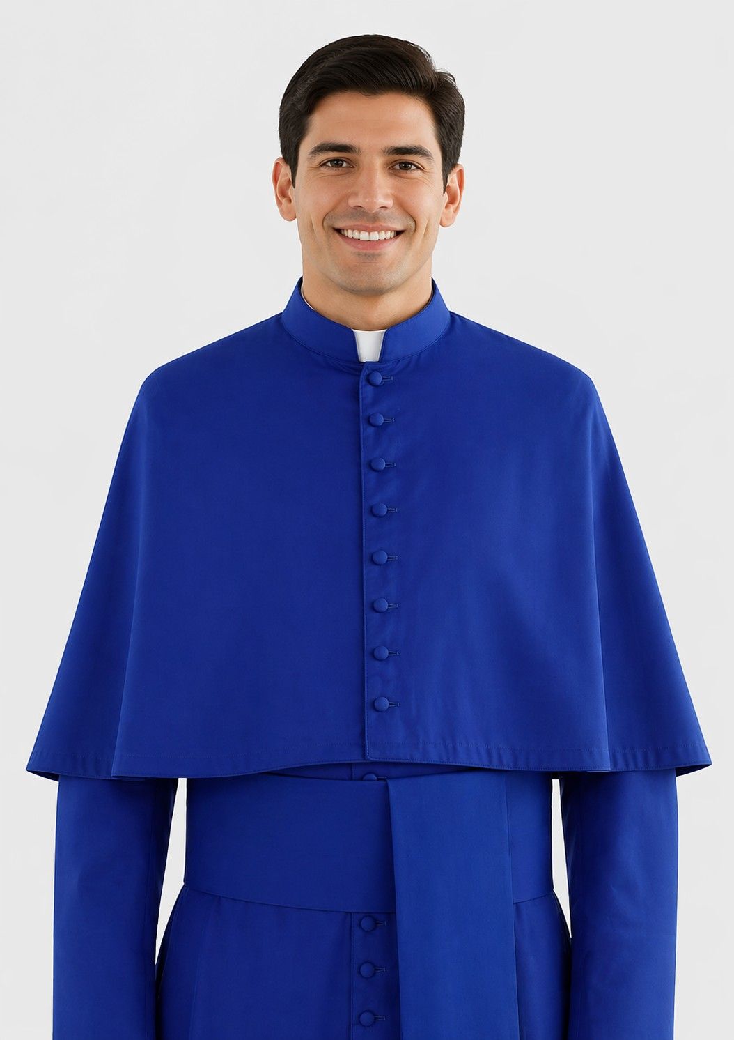 Man wearing a blue clerical robe on a white background