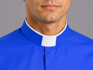 Blue clerical shirt with white collar against a gray background