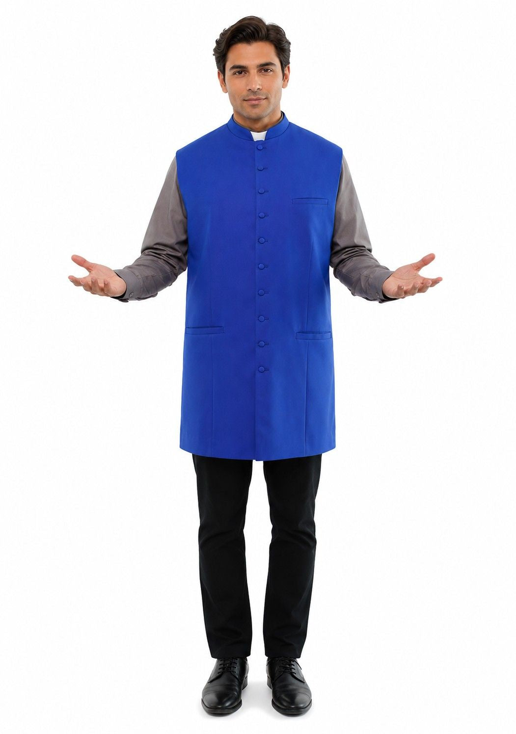 Man wearing a blue vest over a gray shirt on a white background