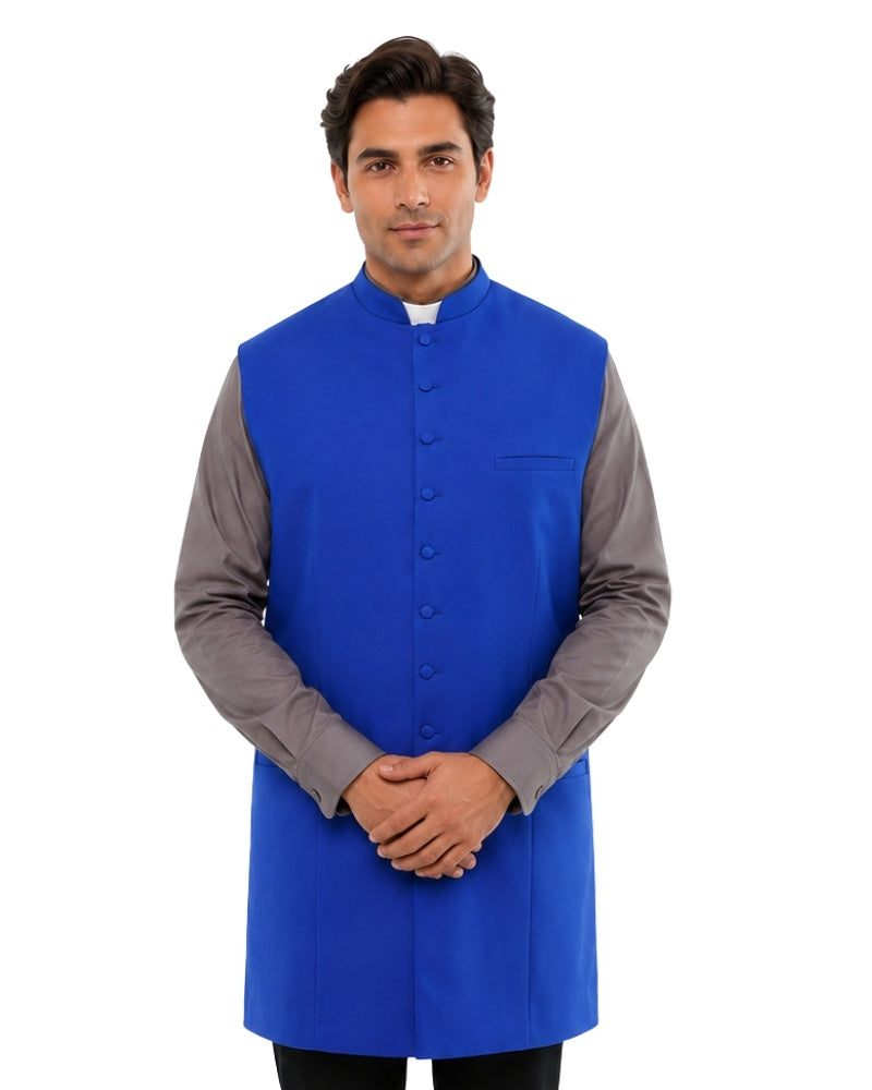 Man wearing a blue vest over a gray shirt on a white background