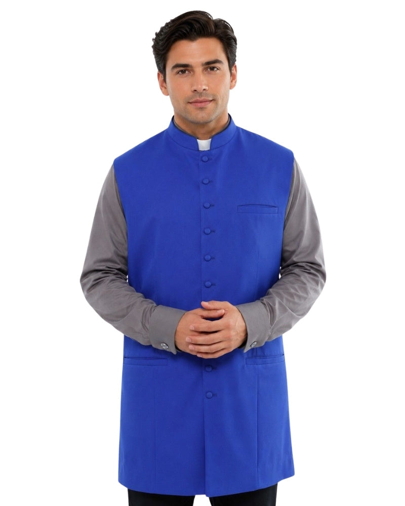 Man wearing a blue vest over a gray shirt on a white background