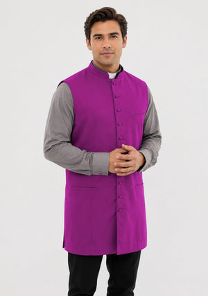 Man wearing a purple vest over a gray shirt on a white background