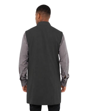 Man wearing a gray vest over a long-sleeve shirt on a white background
