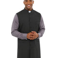 Man wearing a gray vest over a long-sleeve shirt on a white background