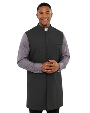 Man wearing a gray vest over a long-sleeve shirt on a white background