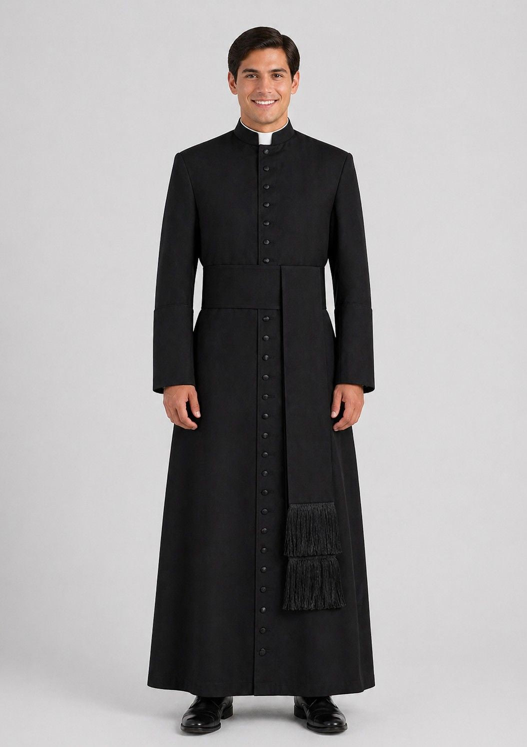 Man wearing a black priest's coat with a white background