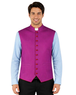 Man wearing a purple vest with re trim over a light blue shirt on a white background.