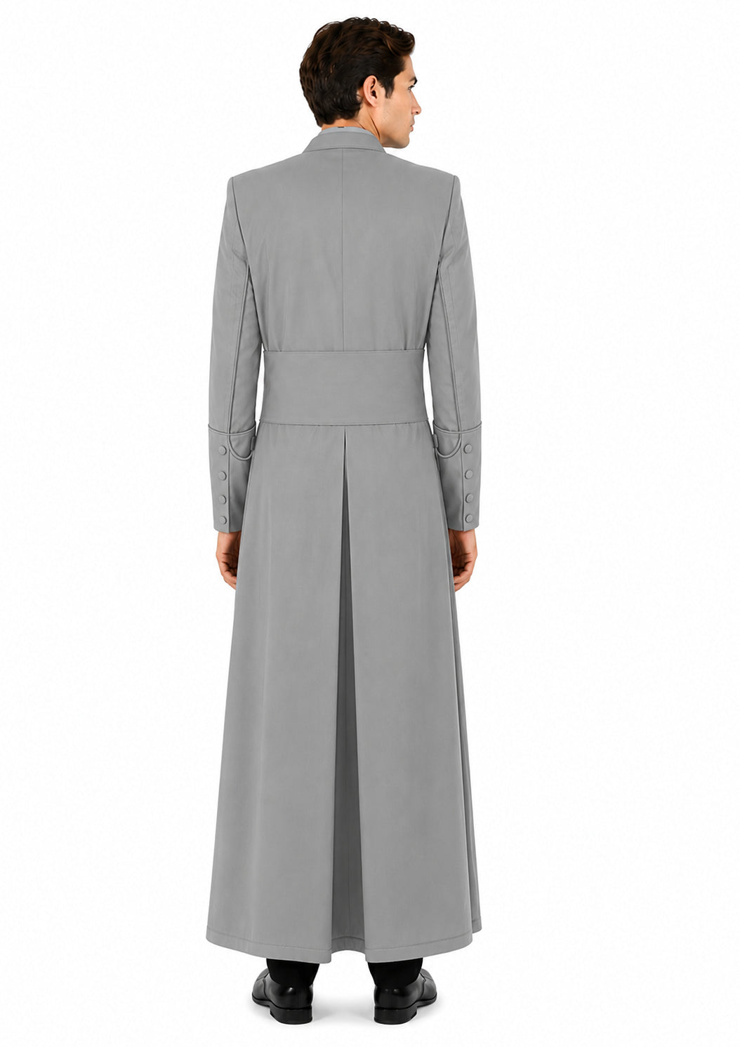 Person wearing a long gray robe on a white background