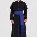 Man wearing a black robe with blue accents on a white background