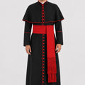 Man wearing a black and red religious robe on a white background