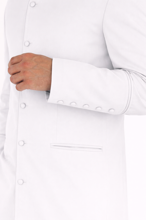 Close-up of a white shirt with buttons and a pocket on white background 