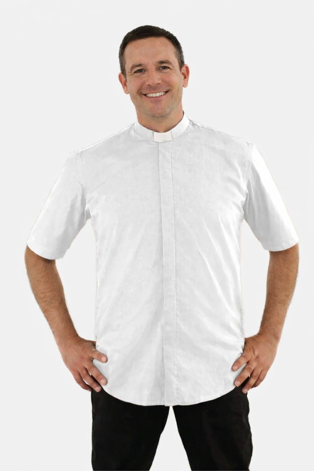 Man wearing a white short-sleeve shirt with a collar on a white background